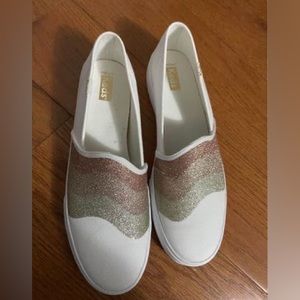 Size 11 brand new Keds slip on sneakers!